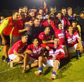 Michael Anderson leads his North Geelong in their Diversity Cup win celebrations